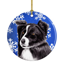 Load image into Gallery viewer, Border Collie Winter Snowflakes Holiday Ornament - Round Ceramic Ornament – Artist-Designed Keepsake Decoration SC9367