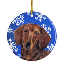 Load image into Gallery viewer, Dachshund Winter Snowflakes Holiday Ornament - Round Ceramic Ornament – Artist-Designed Keepsake Decoration SC9368