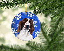 Load image into Gallery viewer, Welsh Springer Spaniel Winter Snowflakes Holiday Ornament - Round Ceramic Ornament – Artist-Designed Keepsake Decoration SC9380