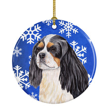Load image into Gallery viewer, Cavalier Spaniel Winter Snowflakes Holiday Ornament - Round Ceramic Ornament – Artist-Designed Keepsake Decoration SC9391