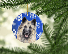 Load image into Gallery viewer, Belgian Tervuren Winter Snowflakes Holiday Ornament - Round Ceramic Ornament – Artist-Designed Keepsake Decoration SC9392