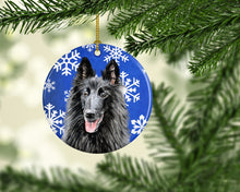 Load image into Gallery viewer, Belgian Sheepdog Winter Snowflakes Holiday Ornament - Round Ceramic Ornament – Artist-Designed Keepsake Decoration SC9398