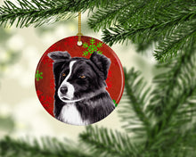 Load image into Gallery viewer, Border Collie Red Snowflakes Holiday Christmas Ornament - Round Ceramic Ornament – Artist-Designed Keepsake Decoration SC9407