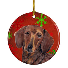 Load image into Gallery viewer, Dachshund Red Snowflakes Holiday Christmas Ornament - Round Ceramic Ornament – Artist-Designed Keepsake Decoration SC9408