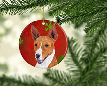 Load image into Gallery viewer, Basenji Red Snowflakes Holiday Christmas Ornament - Round Ceramic Ornament – Artist-Designed Keepsake Decoration SC9427