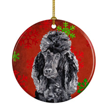 Load image into Gallery viewer, Black Standard Poodle Red Snowflakes Holiday Ornament - Round Ceramic Ornament – Artist-Designed Keepsake Decoration SC9746CO1