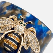 Load image into Gallery viewer, Stripey bee resin napkin rings, blue tortoiseshell, set of four
