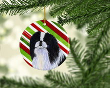 Load image into Gallery viewer, Japanese Chin Candy Cane Holiday Christmas Ornament - Round Ceramic Ornament – Artist-Designed Keepsake Decoration SS4536