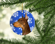 Load image into Gallery viewer, Doberman Winter Snowflakes Holiday Christmas Ornament - Round Ceramic Ornament – Artist-Designed Keepsake Decoration SS4606