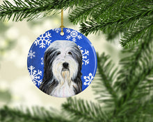 Load image into Gallery viewer, Bearded Collie Winter Snowflakes Holiday Christmas Ornament - Round Ceramic Ornament – Artist-Designed Keepsake Decoration SS4635