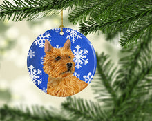 Load image into Gallery viewer, Norwich Terrier Winter Snowflakes Holiday Christmas Ornament - Round Ceramic Ornament – Artist-Designed Keepsake Decoration SS4637