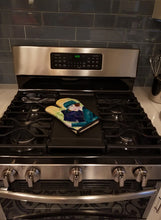 Load image into Gallery viewer, Lady driving with her Briard Oven Mitt SS8549OVMT