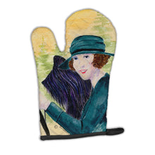 Load image into Gallery viewer, Lady driving with her Briard Oven Mitt SS8549OVMT