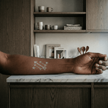 Load image into Gallery viewer, Silver Glitter Arrows Temporary Tattoo