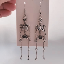 Load image into Gallery viewer, Skeleton Dangle Earrings in Silver | Anatomical Spooky Skeleton Long Halloween Earrings