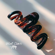 Load image into Gallery viewer, Velvet Claws Hair Clip | '80s Squiggle in Amber | Claw Clip in Velvet Travel Bag