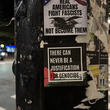 Load image into Gallery viewer, Virtuous Vandalism “There Can Never Be a Justification for Genocide” Sticky Notes 3" x 3" Pack of 50 | Combat and Cover Offensive Public Messages with Adhesive Protest Notes