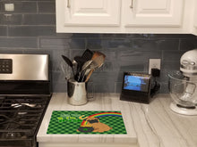 Load image into Gallery viewer, Apricot Pug St. Patrick's Day Glass Cutting Boards – Durable, Decorative Kitchen Art Large