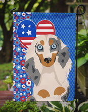 Load image into Gallery viewer, Longhair Cream Dapple Dachshund Patriotic Heart Garden Flag – Red, White &amp; Blue Dog Decor with Star Background