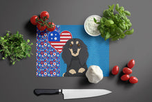 Load image into Gallery viewer, Longhair Black and Cream Dachshund USA American Glass Cutting Boards – Durable, Decorative Kitchen Art Large