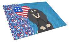 Load image into Gallery viewer, Longhair Black and Cream Dachshund USA American Glass Cutting Boards – Durable, Decorative Kitchen Art Large