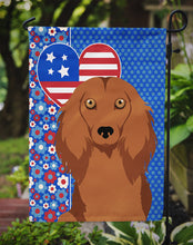 Load image into Gallery viewer, Longhair Red Dachshund Patriotic Heart Garden Flag – Red, White &amp; Blue Dog Decor with Star Background