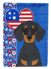 Load image into Gallery viewer, Black and Tan Dachshund Patriotic Heart Garden Flag – Red, White &amp; Blue Dog Decor with Star Background