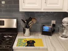 Load image into Gallery viewer, Summer Sunflowers Black and Tan Cavalier Spaniel Glass Cutting Boards – Durable, Decorative Kitchen Art Large