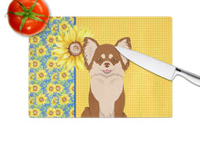 Load image into Gallery viewer, Summer Sunflowers Longhaired Chocolate and White Chihuahua Glass Cutting Boards – Durable, Decorative Kitchen Art Large