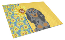 Load image into Gallery viewer, Summer Sunflowers Longhair Blue and Tan Dapple Dachshund Glass Cutting Boards – Durable, Decorative Kitchen Art Large