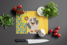 Load image into Gallery viewer, Summer Sunflowers Longhair Cream Dapple Dachshund Glass Cutting Boards – Durable, Decorative Kitchen Art Large