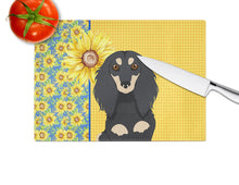 Load image into Gallery viewer, Summer Sunflowers Longhair Black and Cream Dachshund Glass Cutting Boards – Durable, Decorative Kitchen Art Large