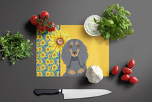 Load image into Gallery viewer, Summer Sunflowers Longhair Blue and Tan Dachshund Glass Cutting Boards – Durable, Decorative Kitchen Art Large