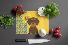 Load image into Gallery viewer, Summer Sunflowers Wirehair Chocolate and Tan Dachshund Glass Cutting Boards – Durable, Decorative Kitchen Art Large