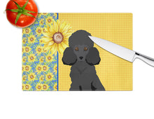 Load image into Gallery viewer, Summer Sunflowers Toy Black Poodle Glass Cutting Boards – Durable, Decorative Kitchen Art Large