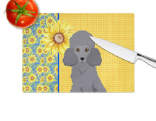 Load image into Gallery viewer, Summer Sunflowers Toy Grey Poodle Glass Cutting Boards – Durable, Decorative Kitchen Art Large