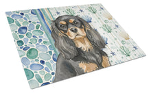 Load image into Gallery viewer, Black and Tan Cavalier Spaniel Coastal Sea Glass Glass Cutting Board