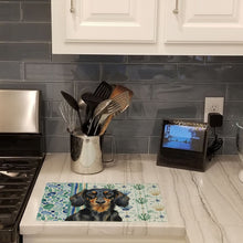 Load image into Gallery viewer, Longhaired Black and Tan Dachshund Coastal Sea Glass Glass Cutting Board