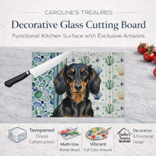Load image into Gallery viewer, Longhaired Black and Tan Dachshund Coastal Sea Glass Glass Cutting Board