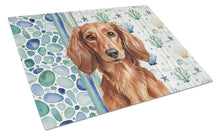 Load image into Gallery viewer, Longhaired Red Dachshund Coastal Sea Glass Glass Cutting Board
