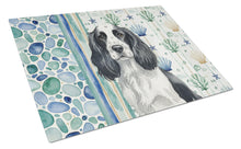Load image into Gallery viewer, Black and White English Springer Spaniel Coastal Sea Glass Glass Cutting Board