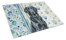 Load image into Gallery viewer, Black Flat-Coated Retriever Coastal Sea Glass Glass Cutting Board