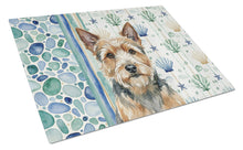 Load image into Gallery viewer, Norwich Terrier Coastal Sea Glass Glass Cutting Board