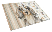 Load image into Gallery viewer, Longhaired Dapple Dachshund Coffee Bar Glass Cutting Board