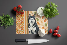 Load image into Gallery viewer, Black and White Alaskan Malamute Heirloom Fall Glass Cutting Board