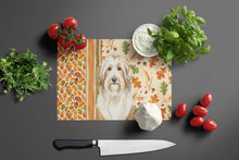 Load image into Gallery viewer, White and Tan Bearded Collie Heirloom Fall Glass Cutting Board