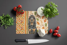 Load image into Gallery viewer, Black and Tan Bloodhound Heirloom Fall Glass Cutting Board