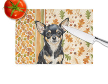 Load image into Gallery viewer, Black and Tan Chihuahua Heirloom Fall Glass Cutting Board