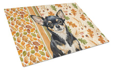 Load image into Gallery viewer, Black and Tan Chihuahua Heirloom Fall Glass Cutting Board