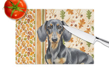 Load image into Gallery viewer, Black and Tan Dachshund Heirloom Fall Glass Cutting Board